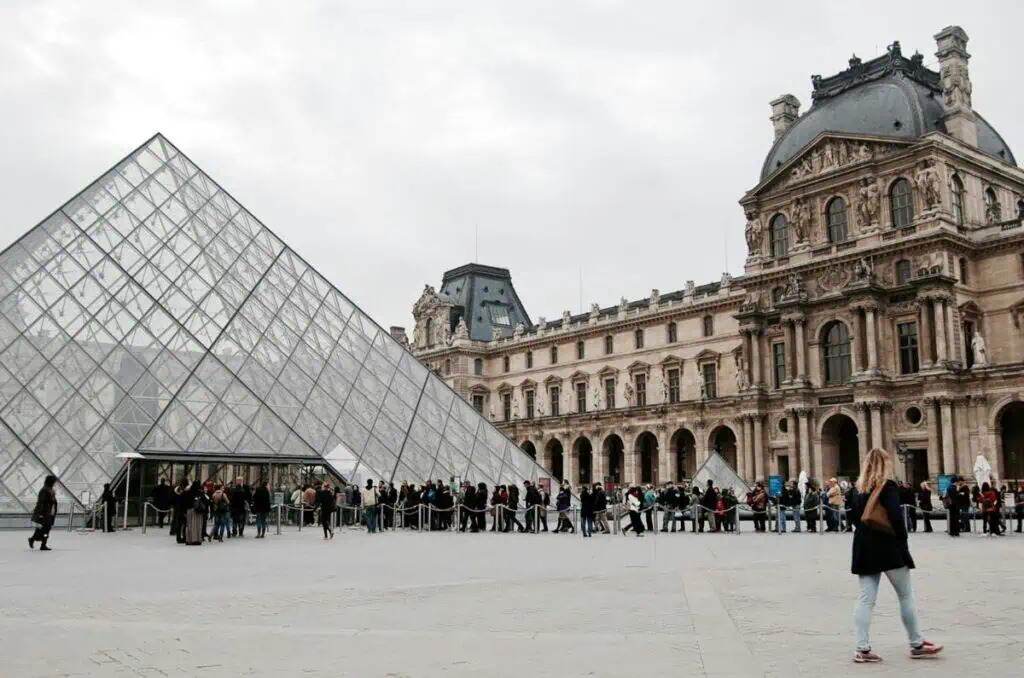 Long queue of tourists waiting to enter the Louvre Museum at the iconic glass pyramid entrance in Paris, France.

These file names are SEO-friendly with descriptive keywords, while the meta titles and descriptions provide clear, concise information about each image's content.RetryClaude can make mistakes. Please double-check responses. Sonnet 4